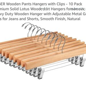 Like new (set of 10) Wooden Hangers with Metal Clips. Multiple sets available.